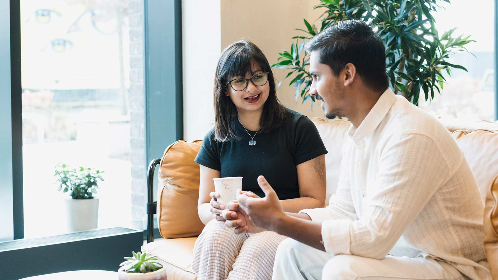 Students sat at a cafe