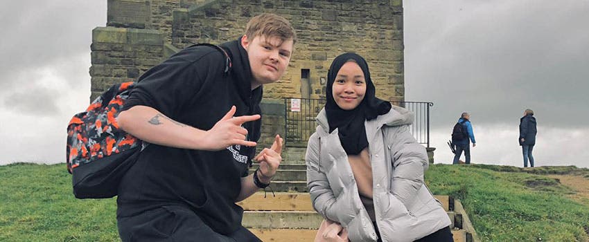 International student Nur poses with another student