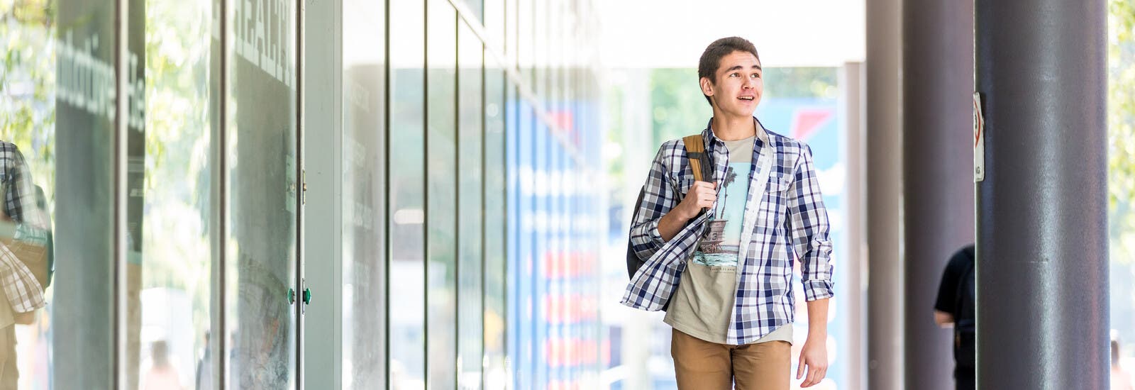 Student walking through campus