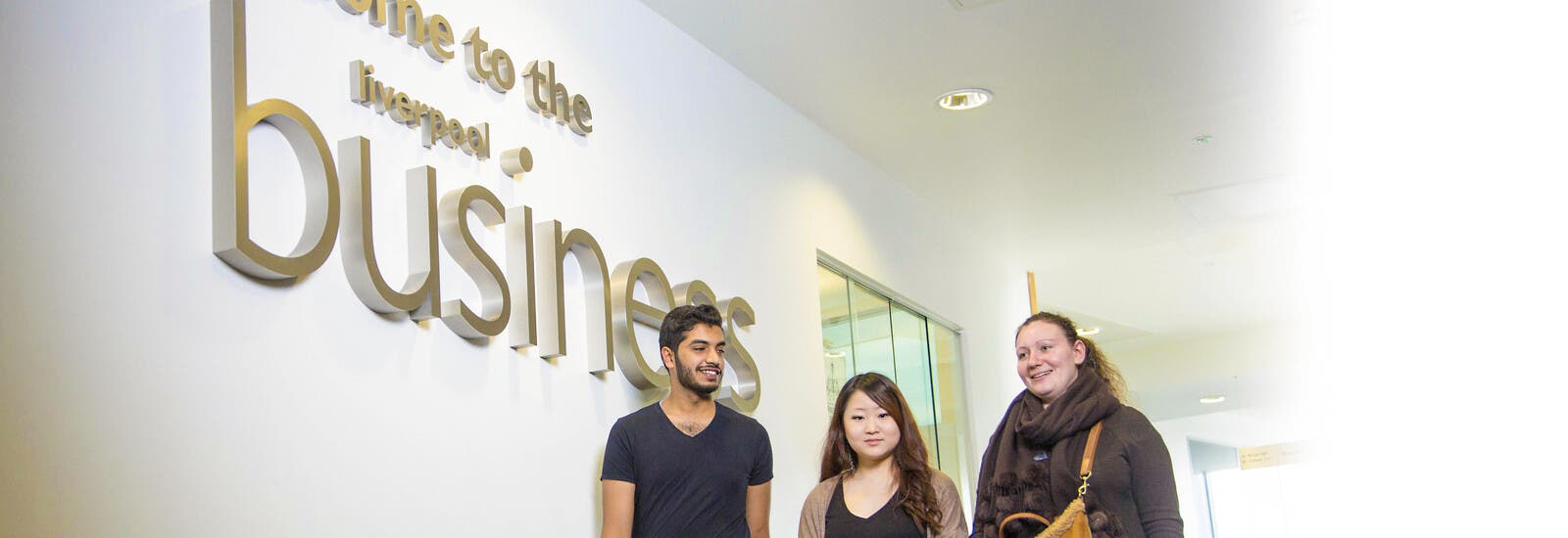 Three students in LJMU's Business School