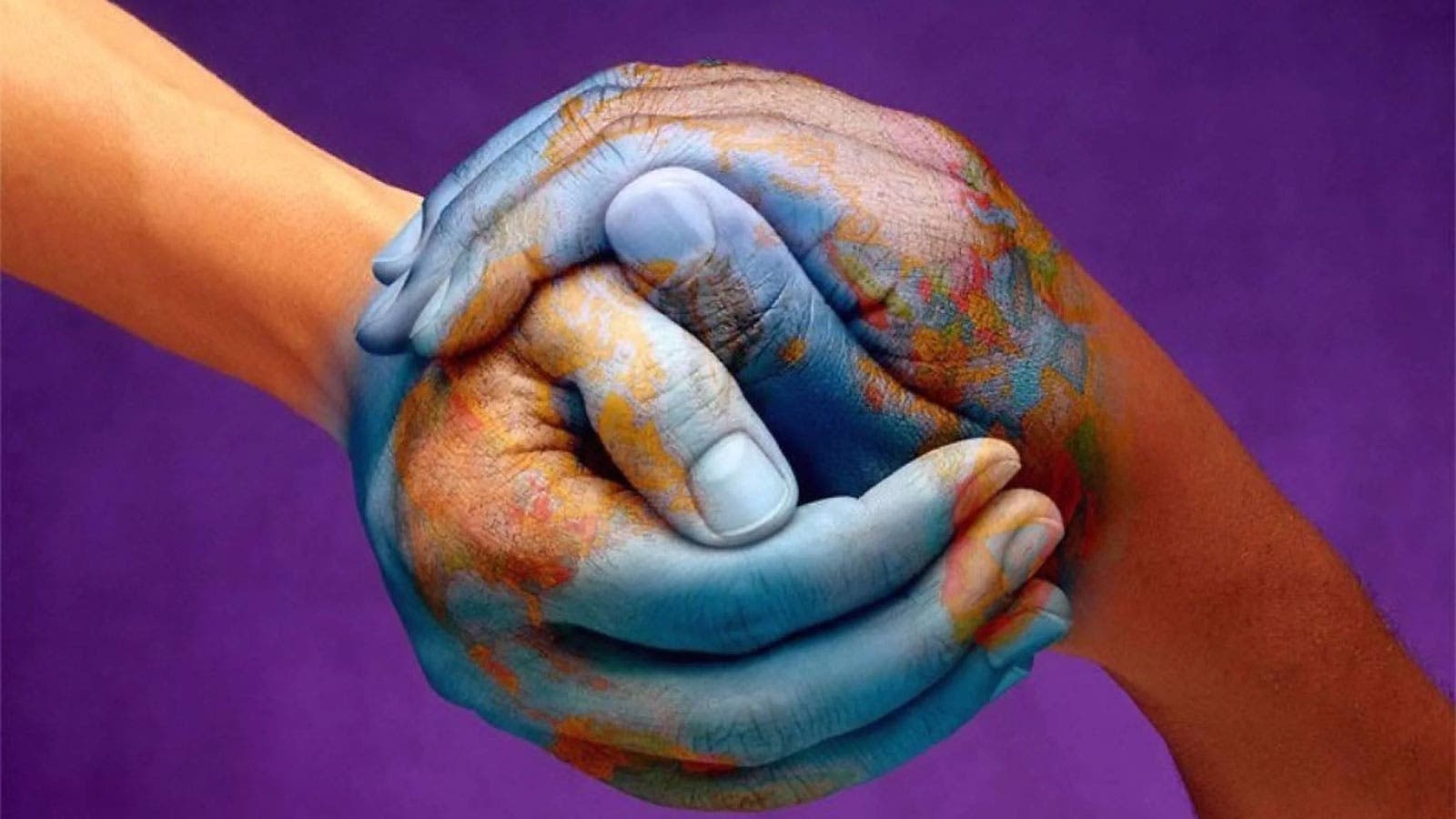 Hands clasped together in shape of a globe