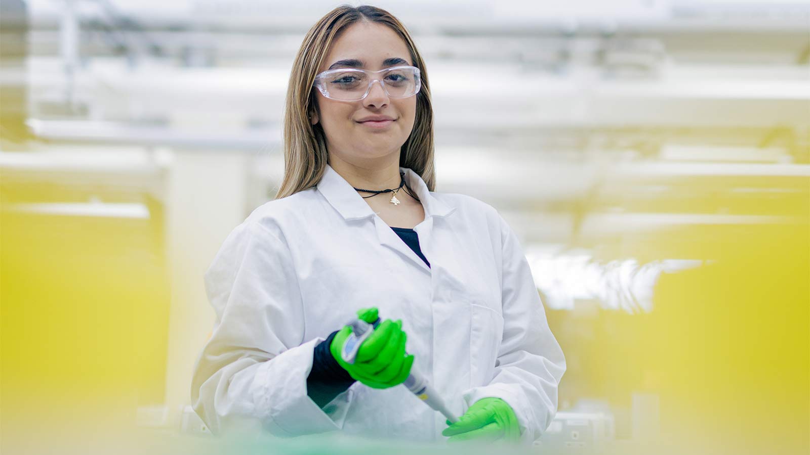 A photo of international student Arpi in a laboratory