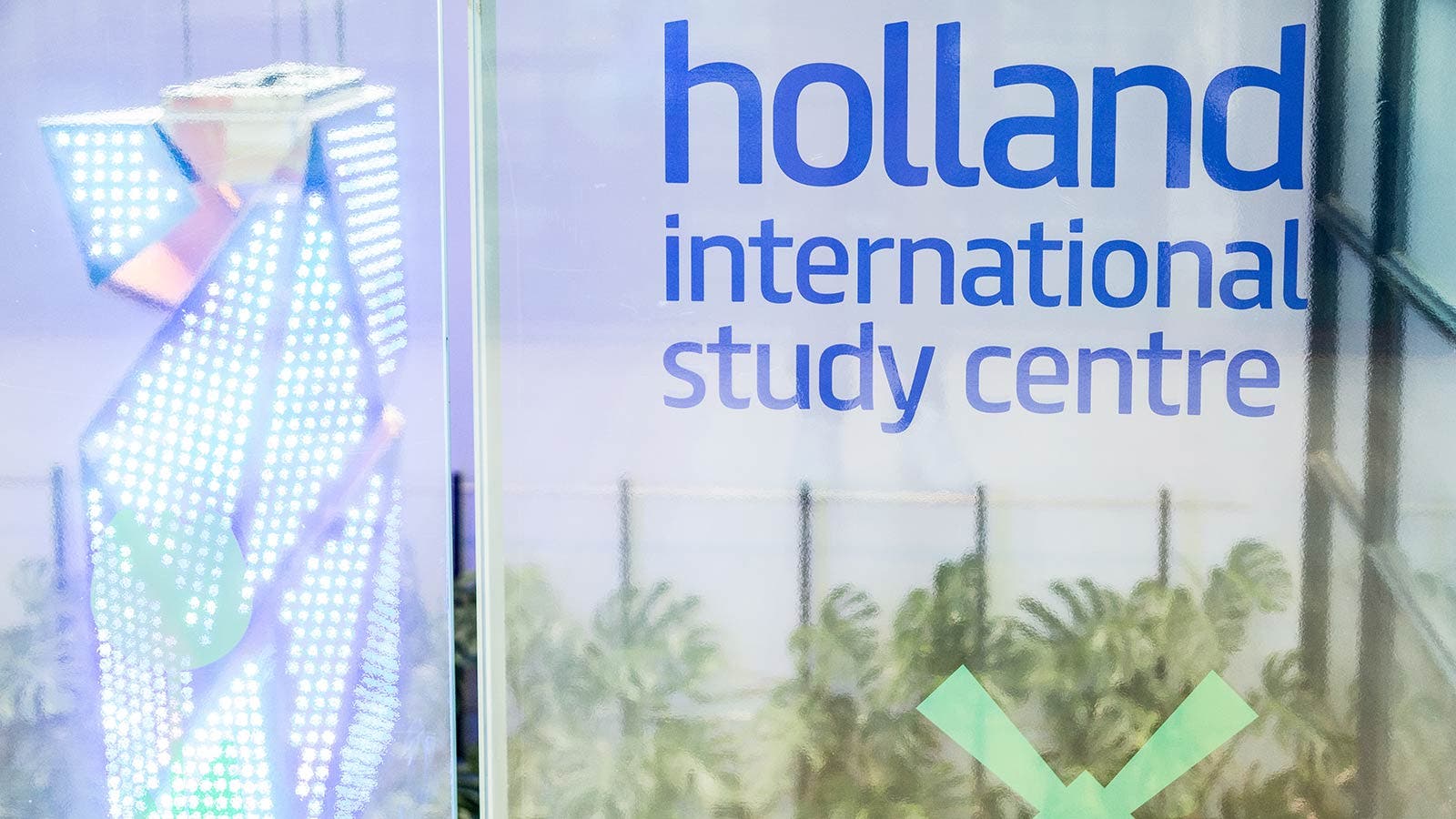 The Holland International Study Centre logo on a door.