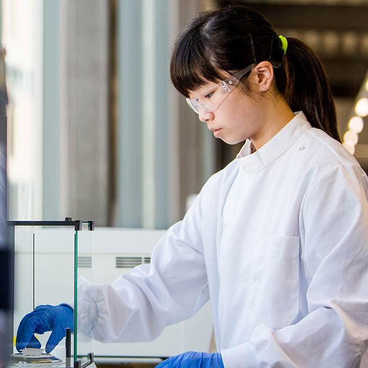 Robyn from Hong Kong works in a lab on campus
