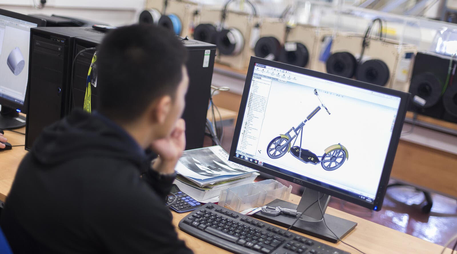 A student working on an engineering project.