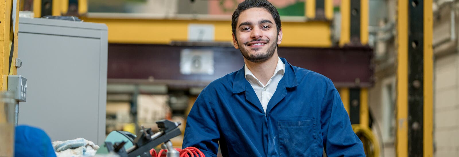 Engineering student smiling at camera