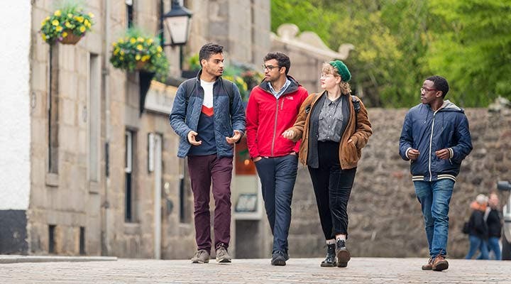 A group of students walking through Aberdeen