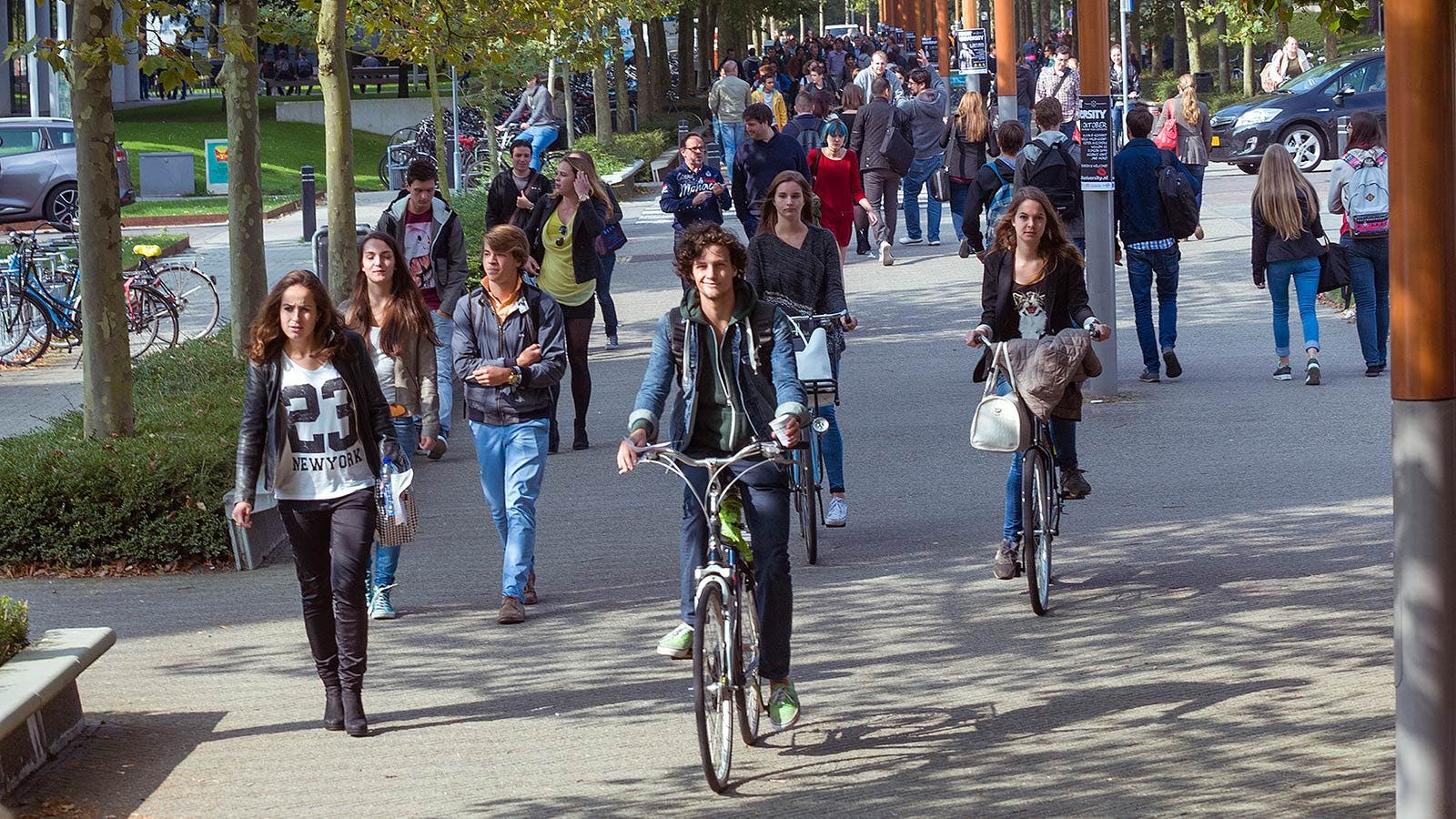 Students cycling around campus