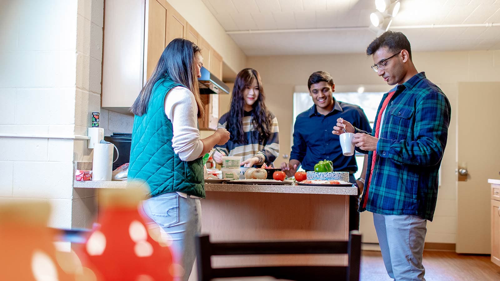 Students in kitchen in accommodation