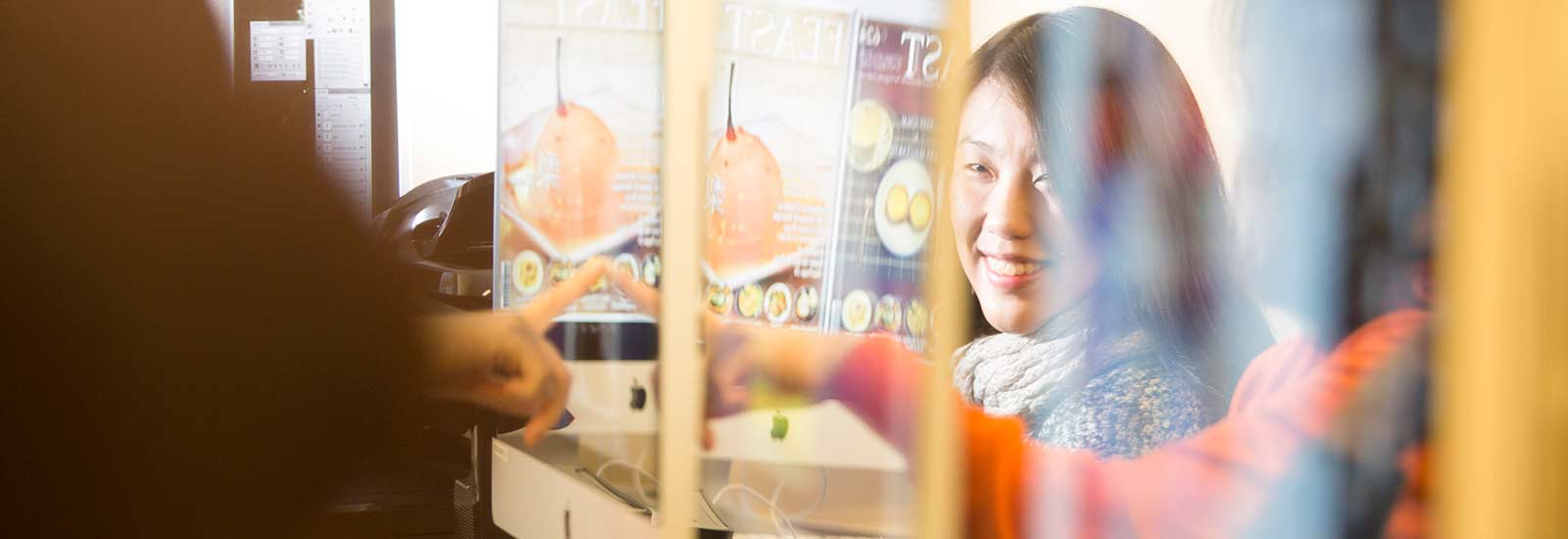 Bellerbys Global students working on a computer together