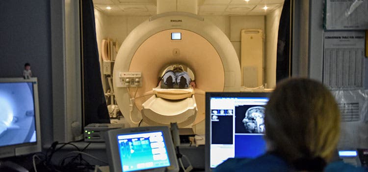 Student learning to use MRI machine