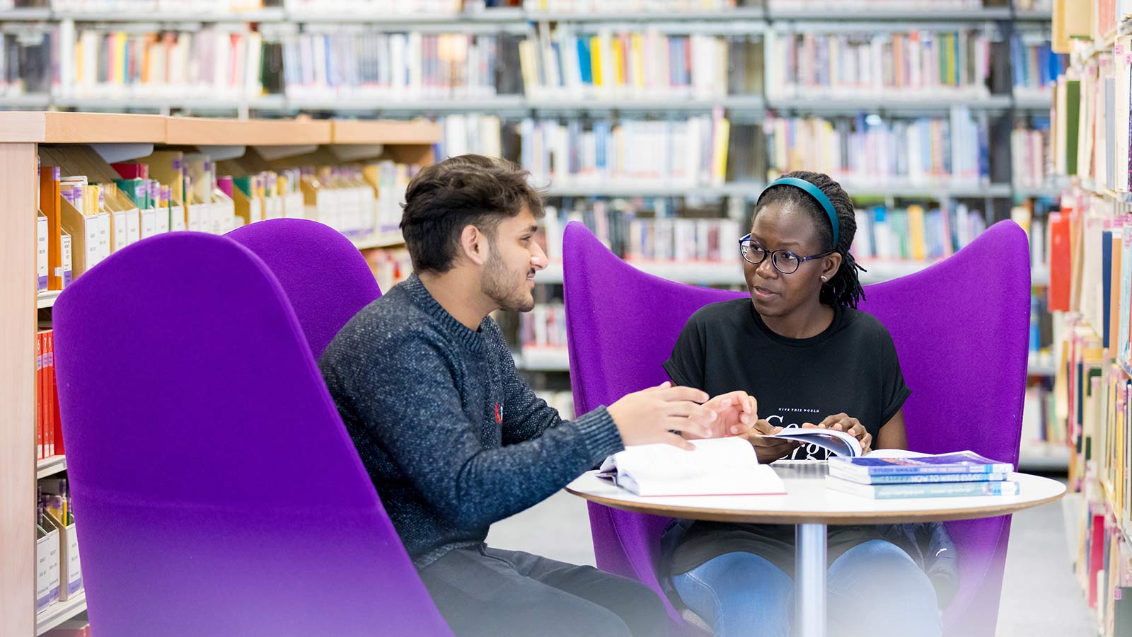 Kingston University students sat in the library
