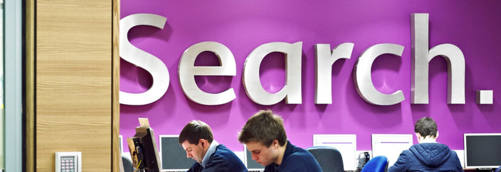 Students studying in computer suite