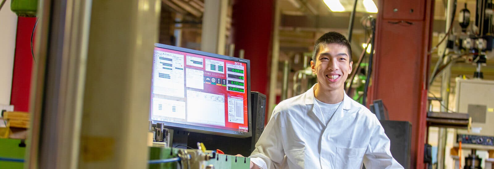 Engineering student smiling at camera