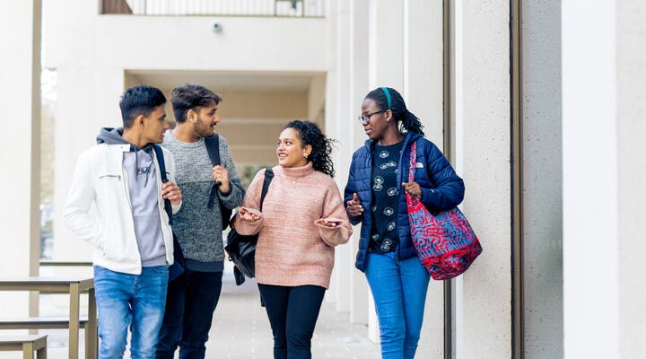 Four students on Kingston's campus