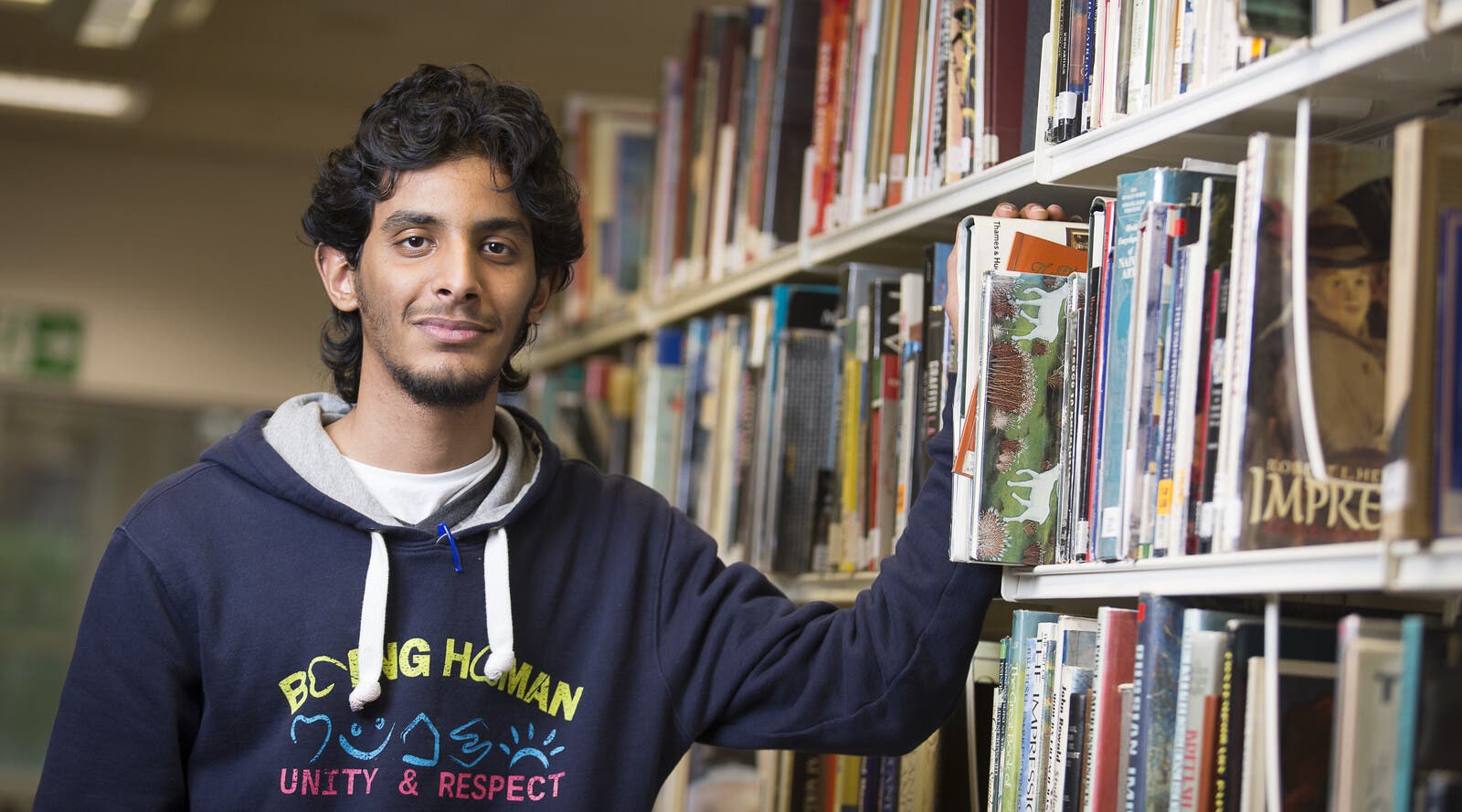 Majed, an international student, in the library.