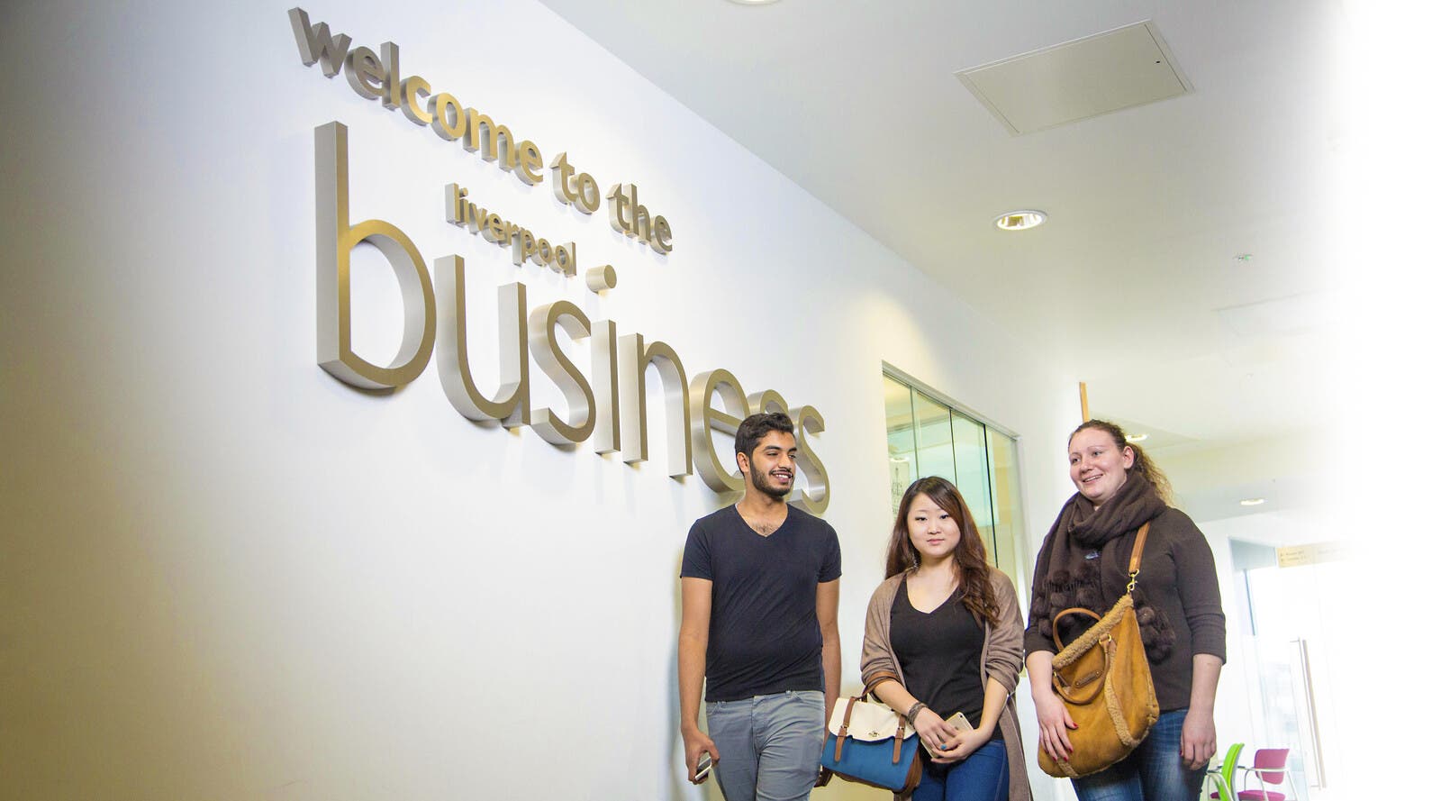 Three students in LJMU's Business School