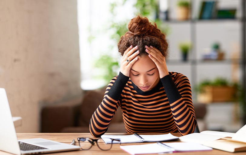 Woman stressed at the office