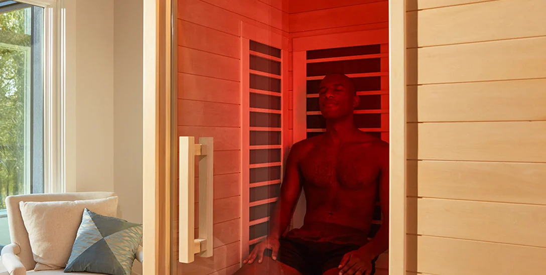 Man relaxing in the Signature Infrared Sauna