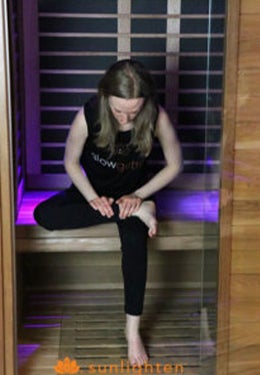 Seated stretch in sauna