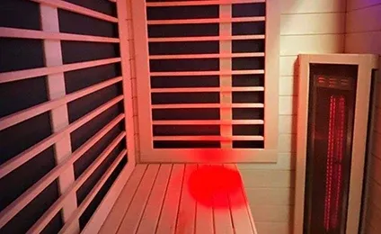 The interior of a Sunlighten Amplify sauna showing the additional heaters for high intensity heat.