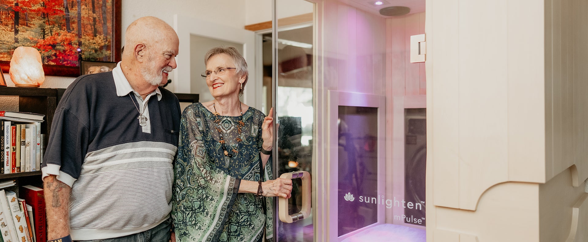 Ginny Marriott and husband in front of mPulse sauna