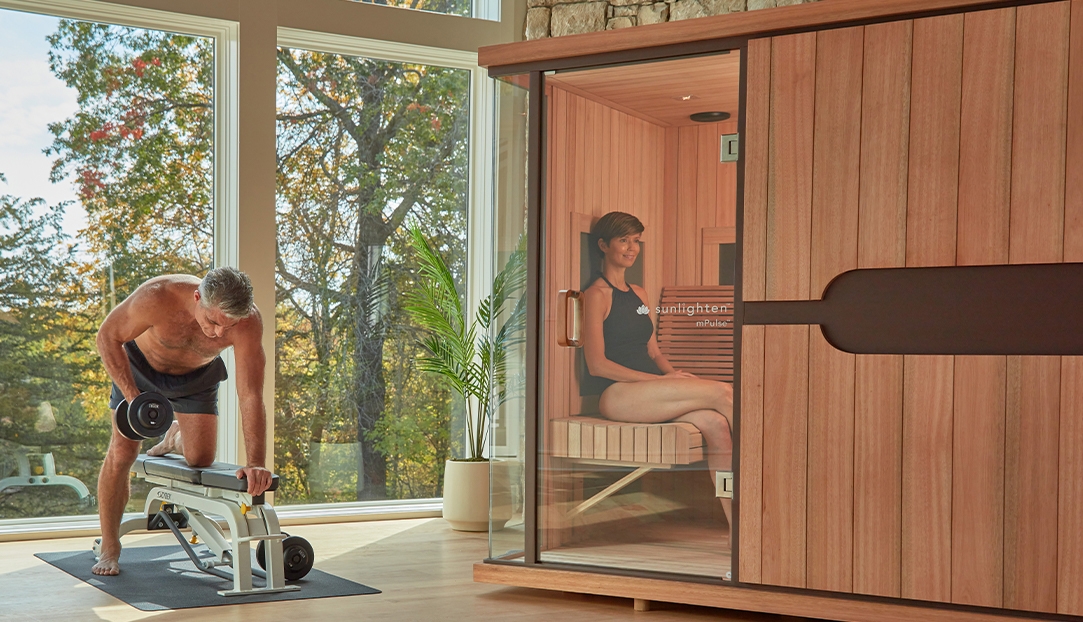 Man working out outside sauna with woman in sauna