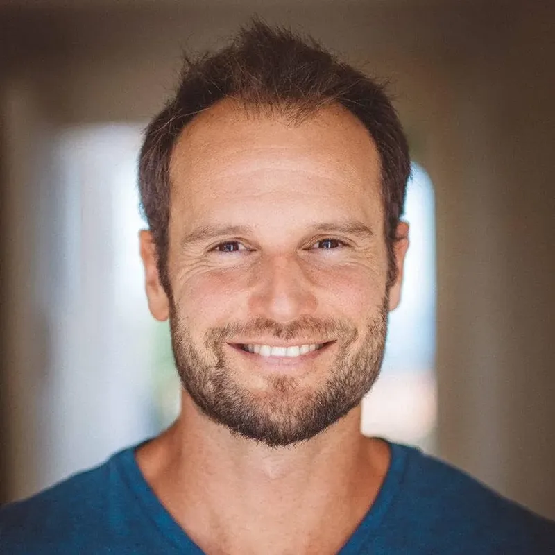 ari-headshot copy.webp