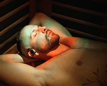 Man relaxing in sauna 
