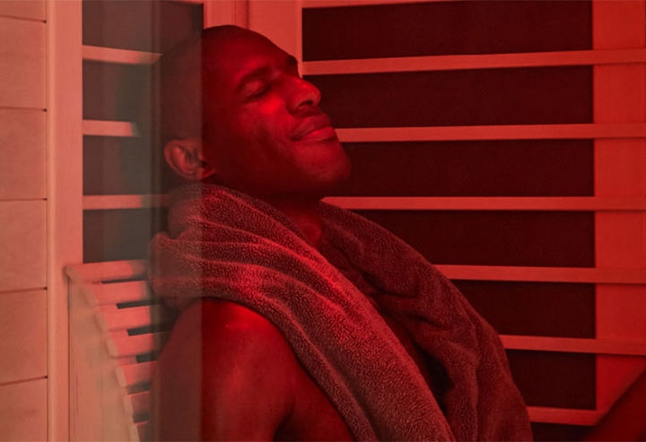 Man enjoying an at home infrared sauna