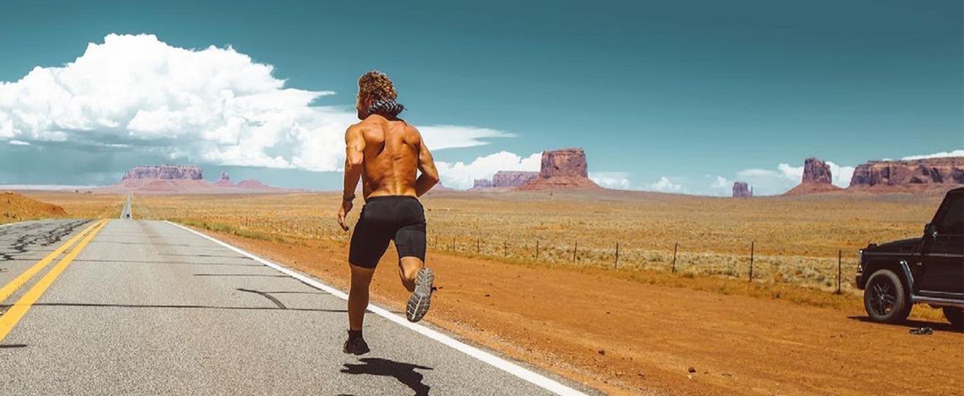 Eric Hinman Running on road in Utah.