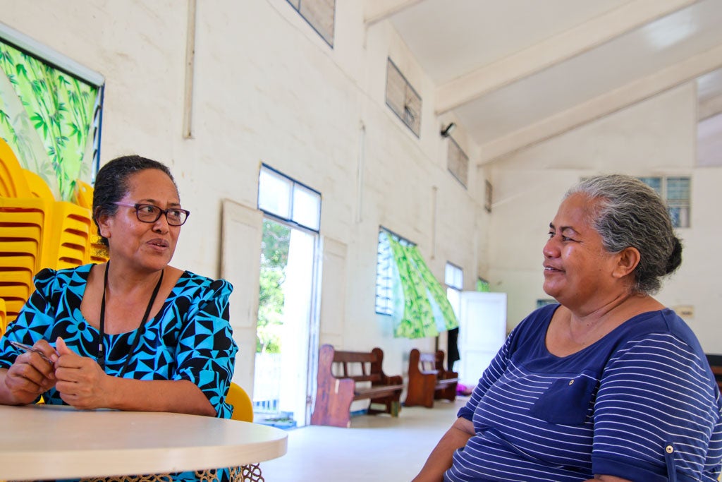 Mafi speaks with Maaimoa at UICEF -supported psychosocial support (PSS) activities.