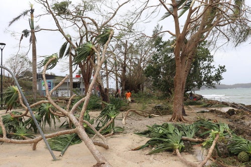 After twin cyclones hit Vanuatu, a beach is left destroyed. 