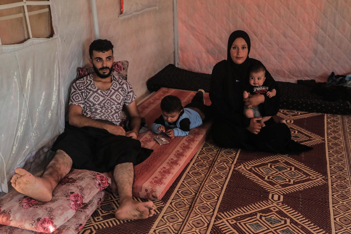 Masoud and his wife and their two children in Gaza.