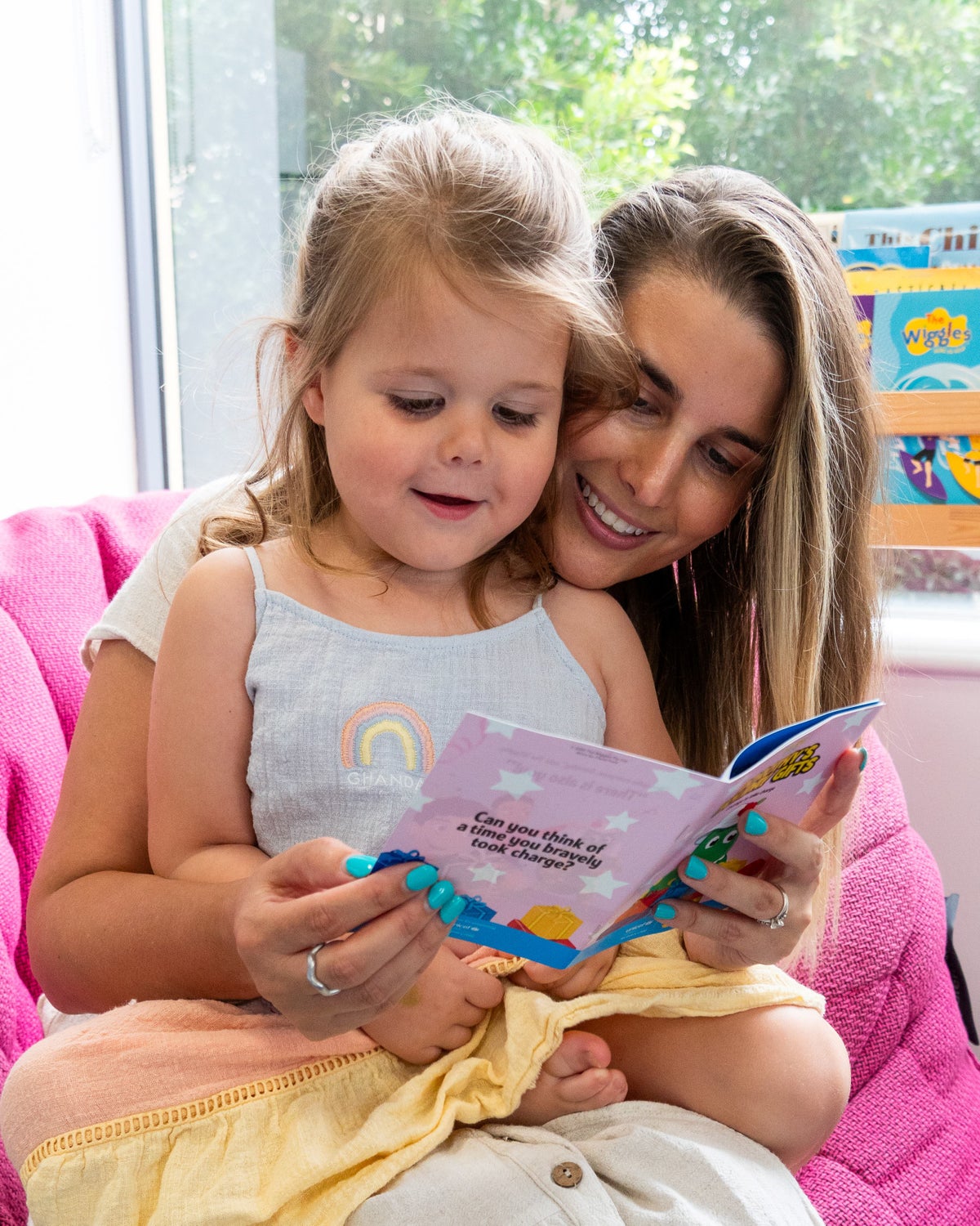 Mother and daughter reading The Wiggles Brave Little Books
