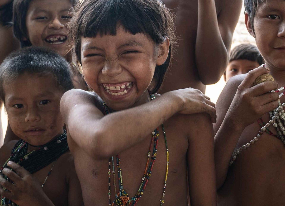 Lujemar, 10, smiles at the camera after receiving his vaccination.