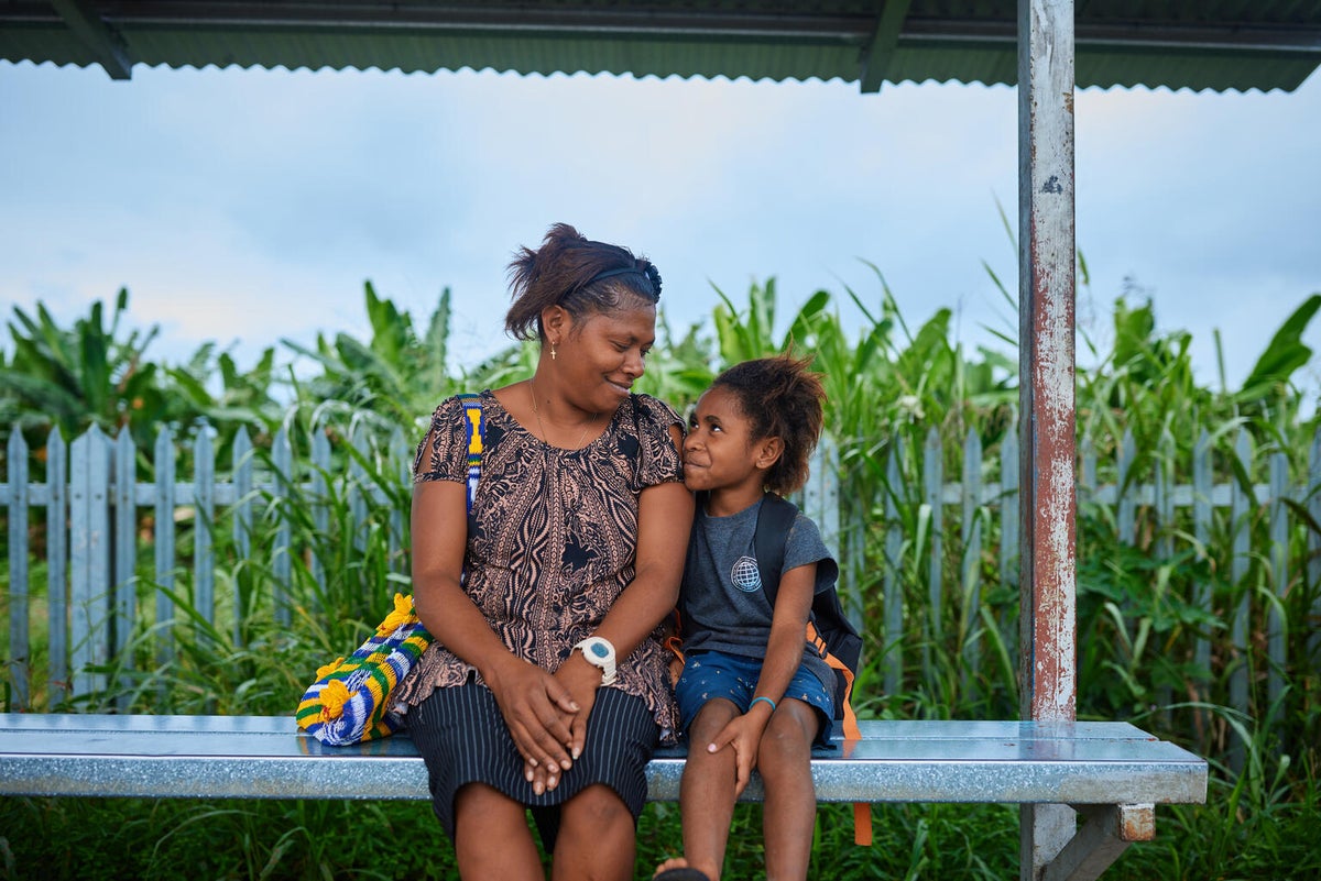 A woman with her seven-year-old daughter.