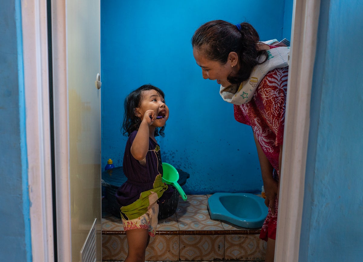 Child cleaning teeth