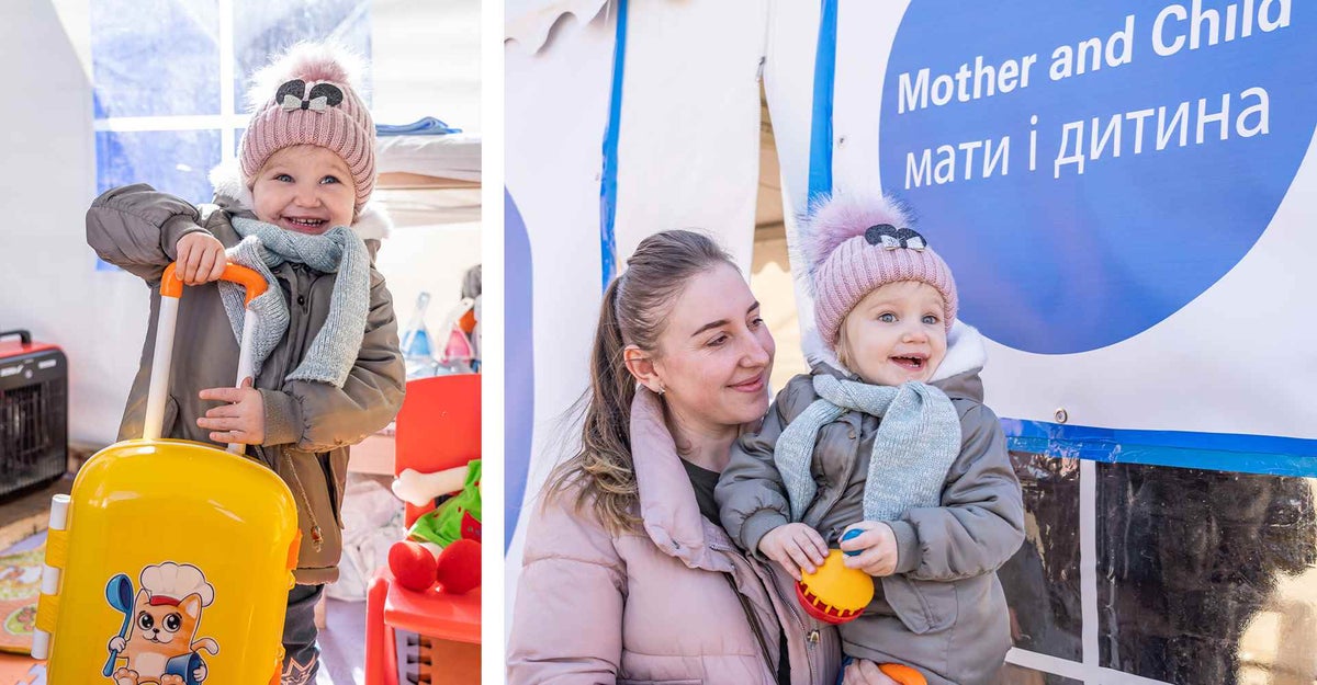 Emilia plays with her mobile kitchen set at the UNICEF-supported Blue Dot hub at the border crossing in northern Romania.