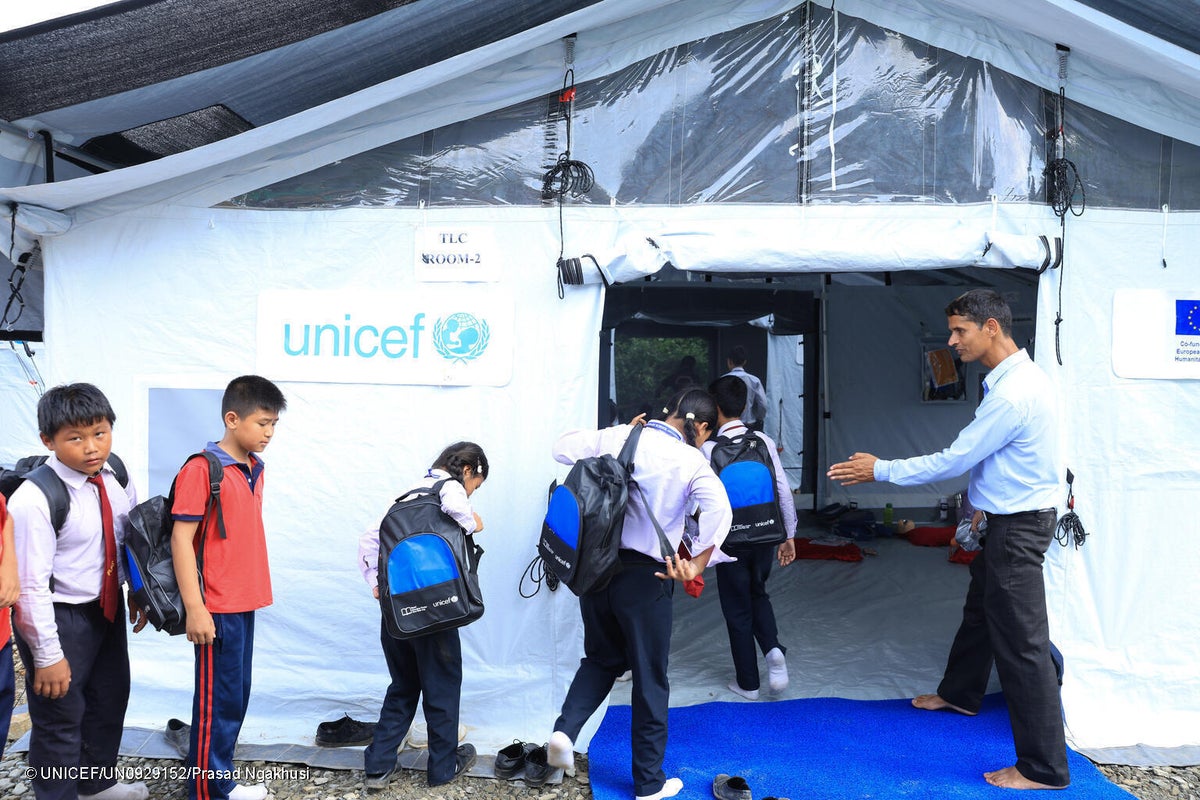 Children return to learning in temporary learning centres set up with UNICEF support after devastating floods damaged classrooms and disrupted education in affected communities.
