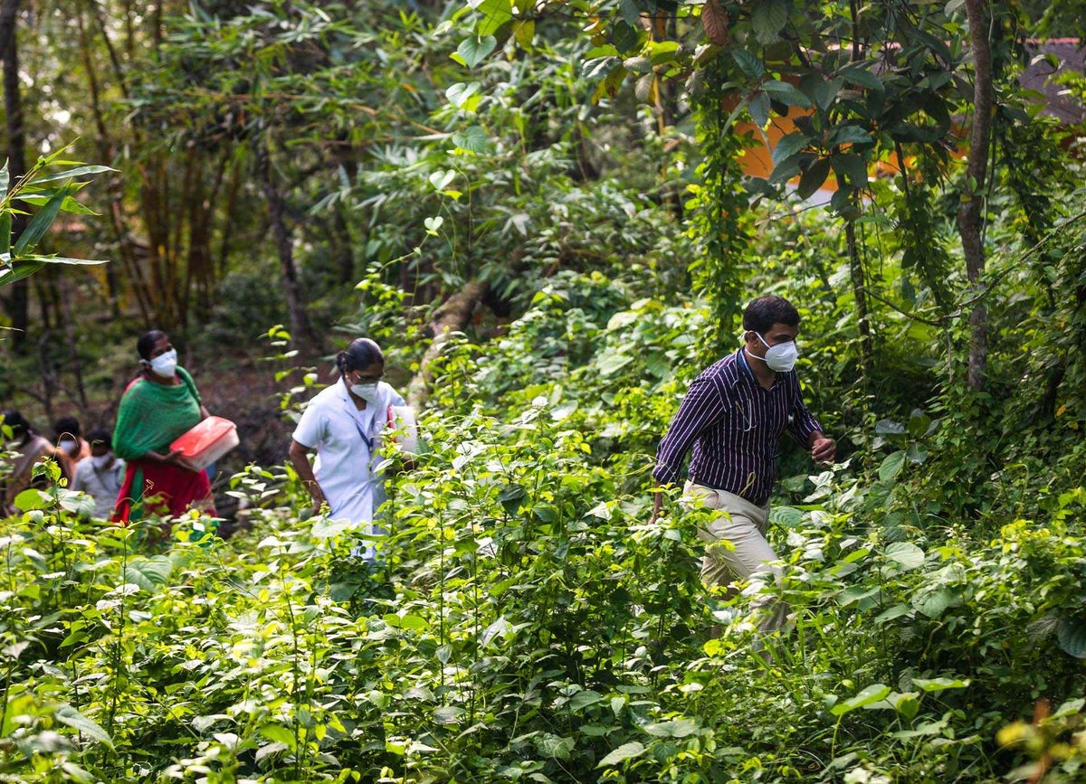 Dr. Aneesh and his team on their way to vaccinate people on Munroe Island.