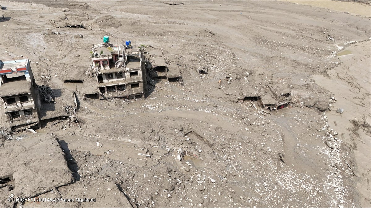 Views of settlements in central northern Nepal covered in mud following the devastating flash floods that swept through the area on 26 August, causing widespread destruction to homes, and roads.