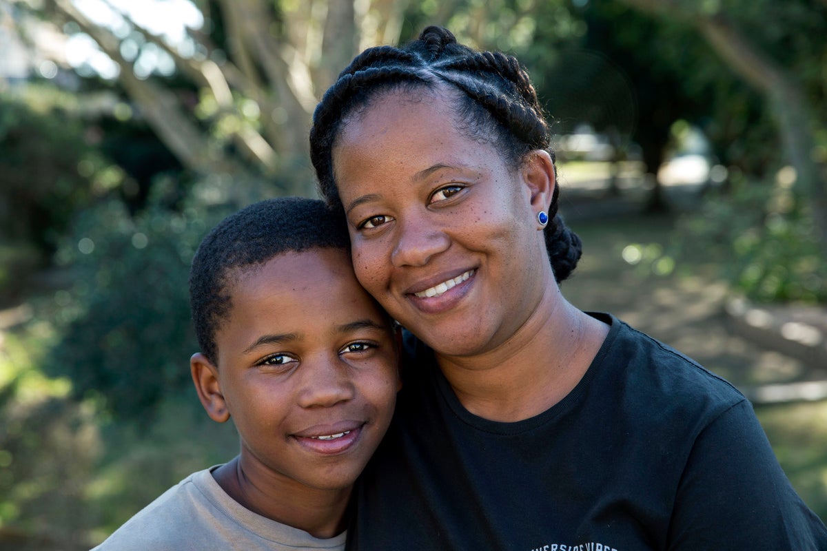 Livey poses to the camera with her son Remi.