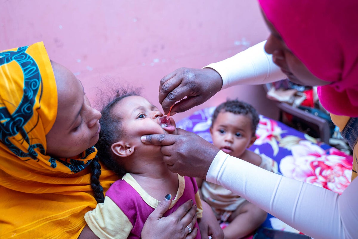 A child getting vaccinated against polio in Sudan