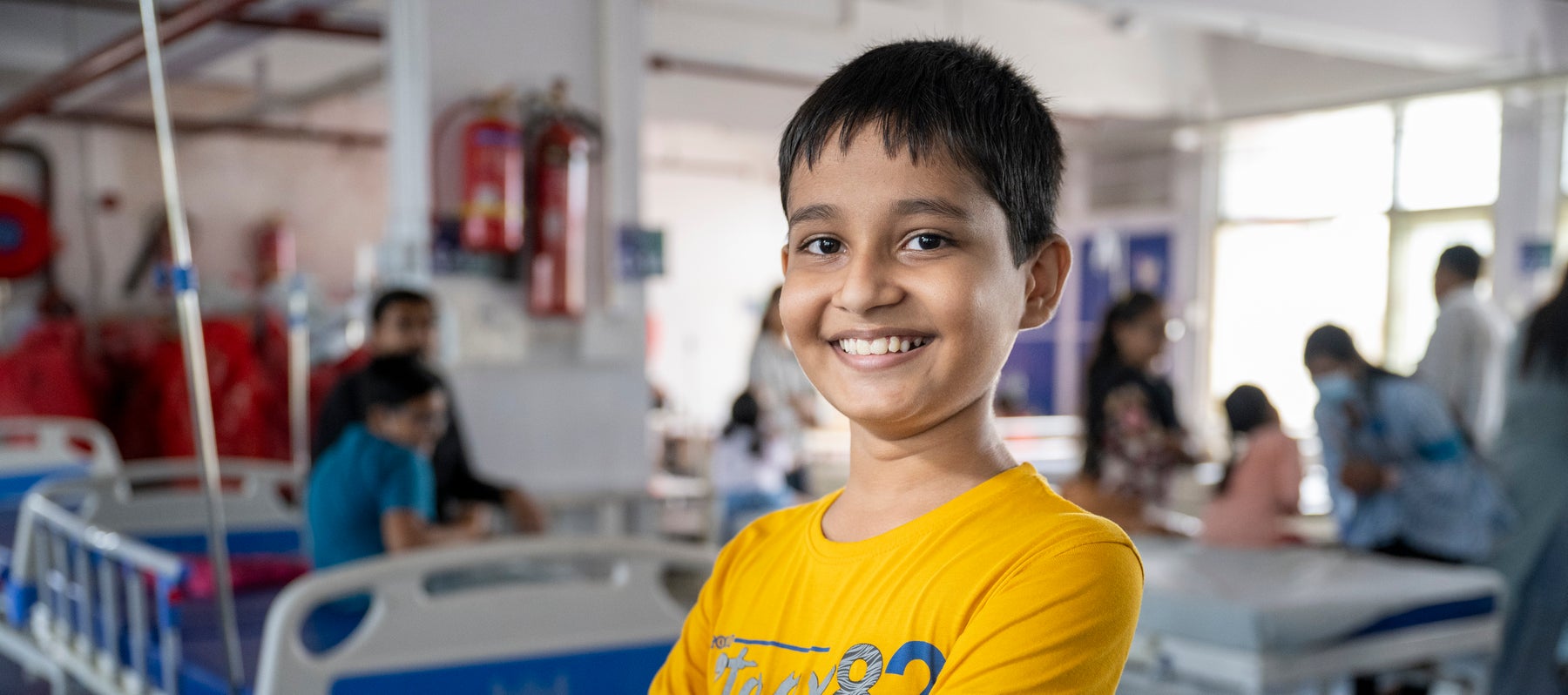 Munaf, 11, is happy and healthy after recovering from a COVID-associated illness in May 2021.