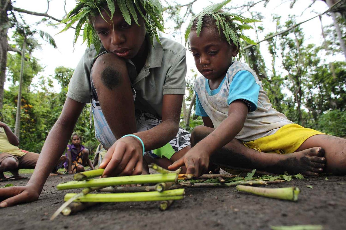 Children from Vanuatu's Tanna community take time out to play traditional games called Nawakilan