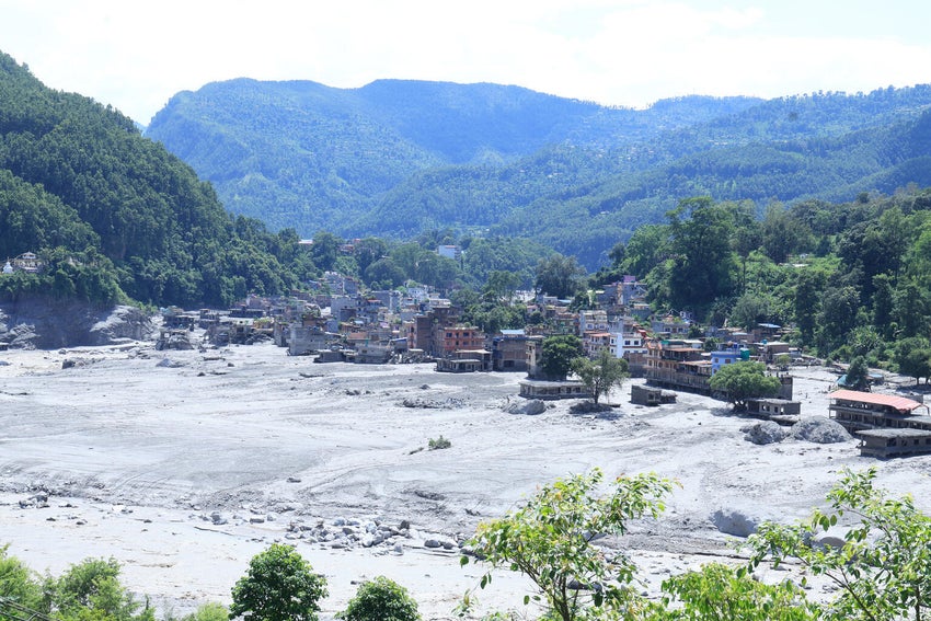 Views of settlements in Nuwakot District, Nepal, show homes and surrounding areas covered in mud after devastating flash floods swept through central northern Nepal.