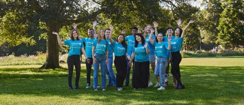 Young Ambassadors standing together at the park