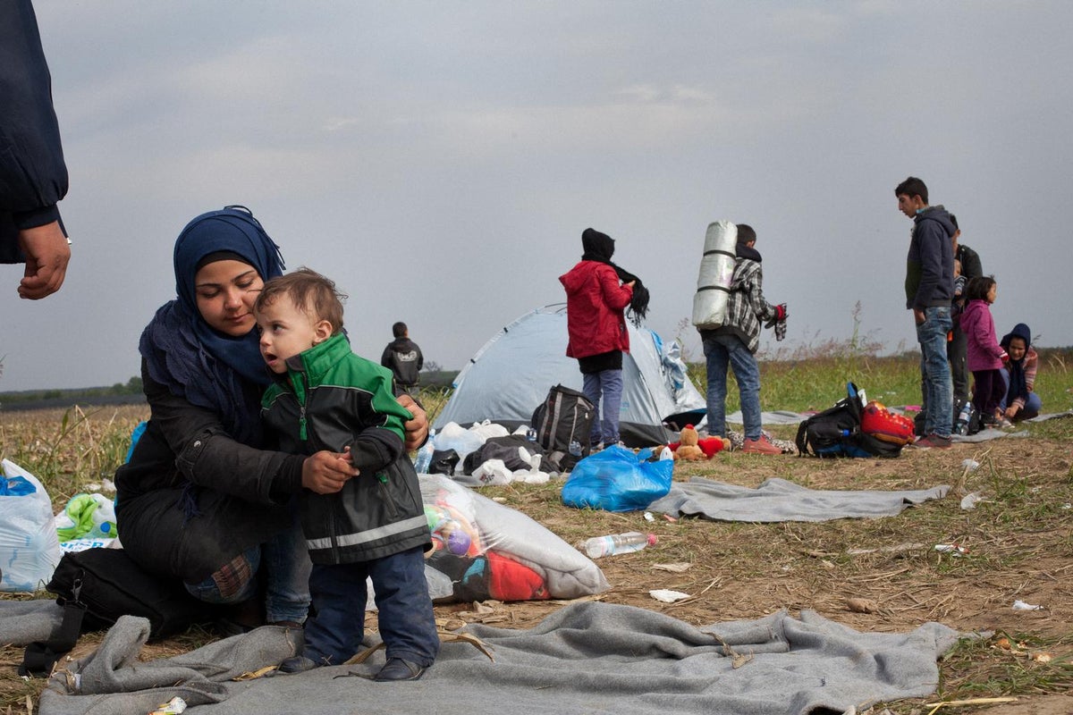 Serbian refugees and migrants crossing into Europe