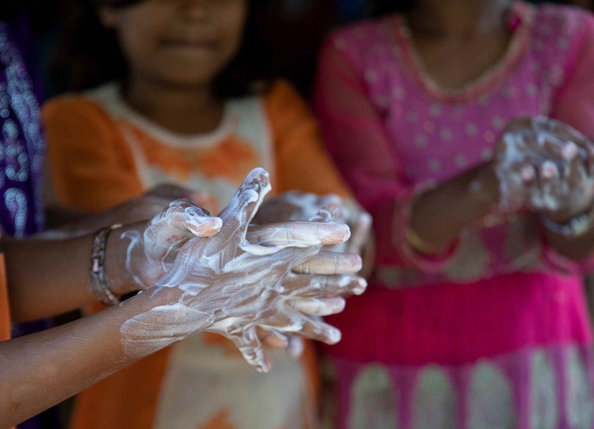 Children wash their hands with soap at a UNICEF-supported learning centre in the Rohingya refugee camp, in Cox’s Bazar, Bangladesh. 